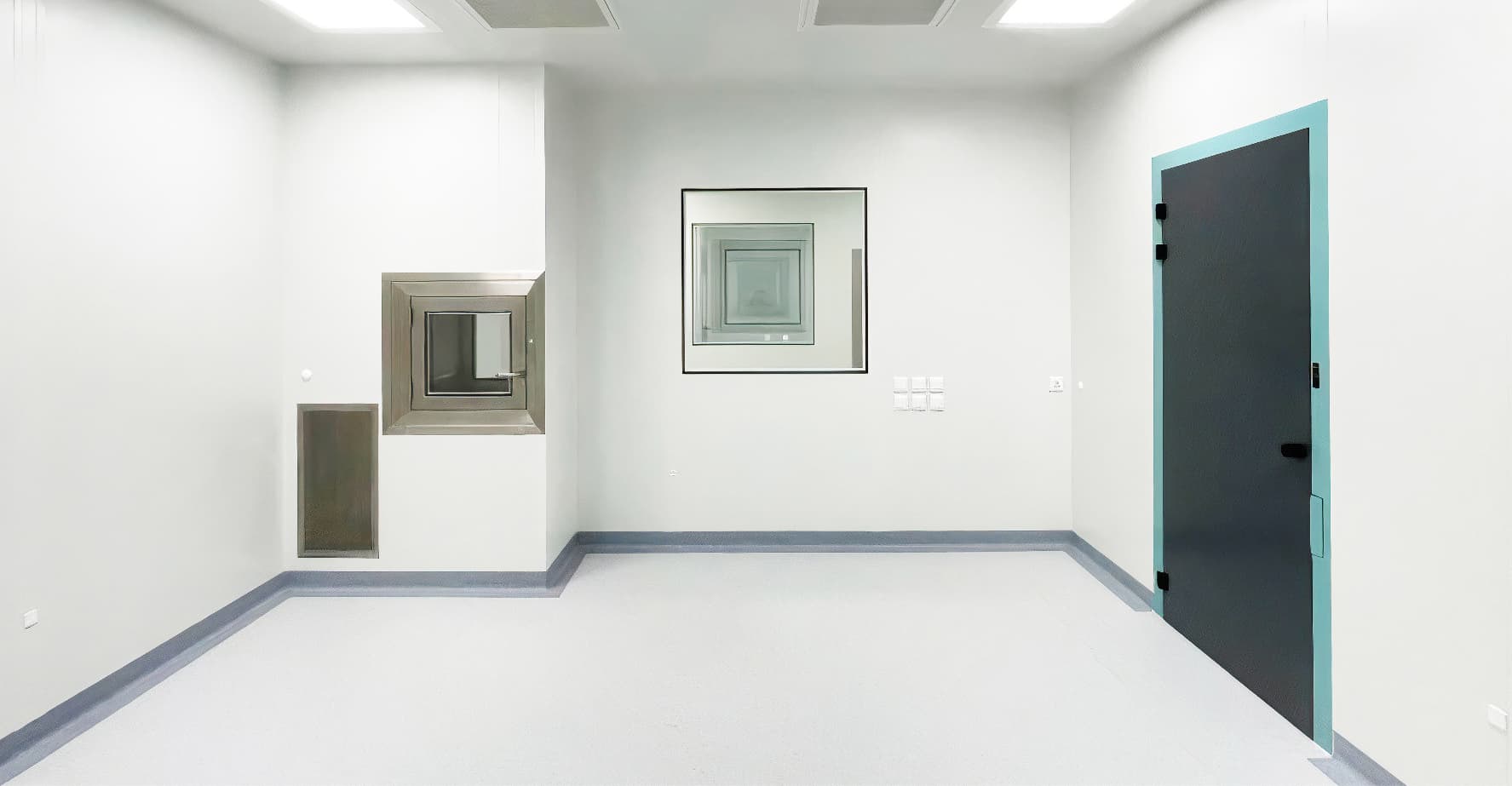 white room with a grey door